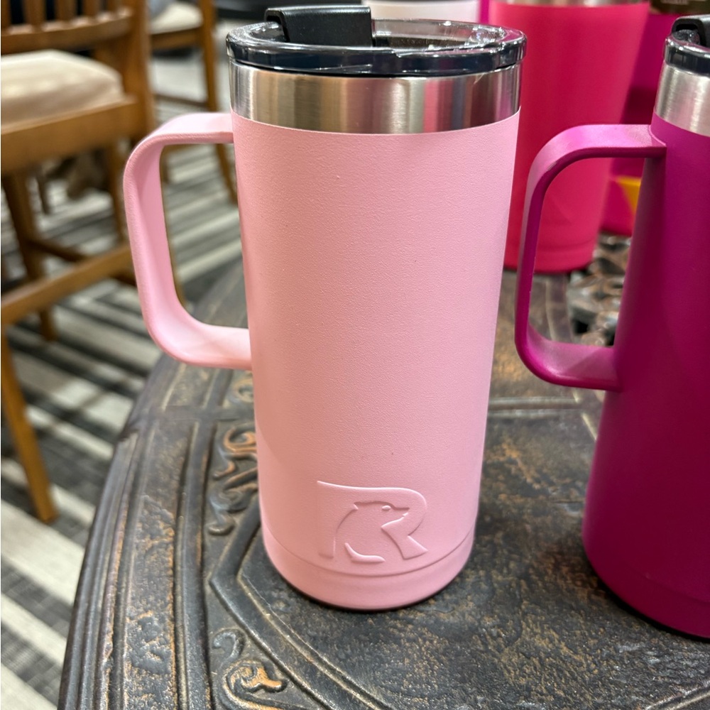 Rtic slim pink coffee insulated coffee cup with sip lid, these were in cabinet.
